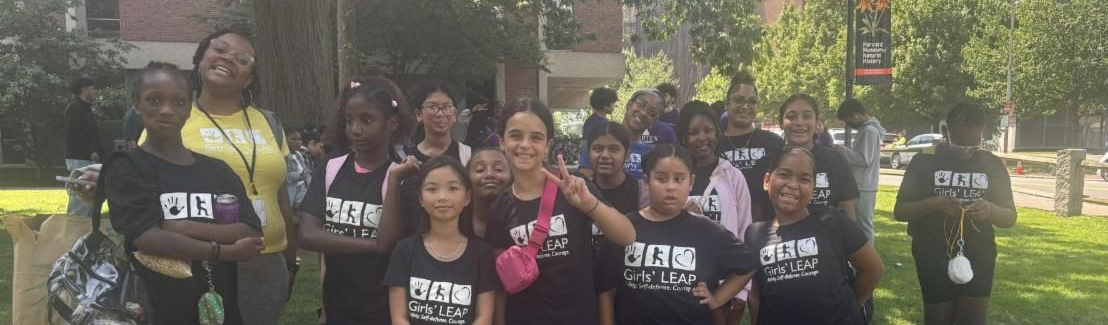 Group of girls outside wearing Girls' LEAP shirts